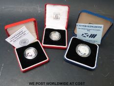 Two £1 silver proof Piedfort coins 1983 and 1987,