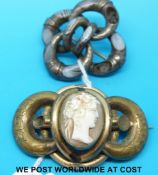 A silver knot brooch set with agate sections and a cameo brooch