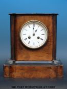 A late 19thC French mantel clock with two train movement striking on a bell,