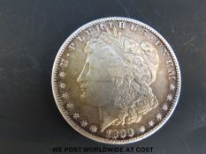 An 1899 Morgan USA dollar with San Francisco mint mark