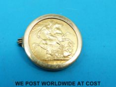 A 9ct gold brooch set with an 1887 gold full sovereign (9.