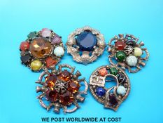 Four Miracle brooches,