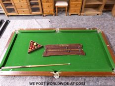 A quarter size slate snooker table by E.G.