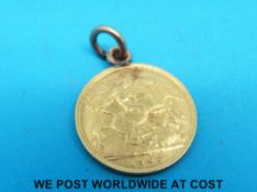 A 1905 gold half sovereign with loop mount