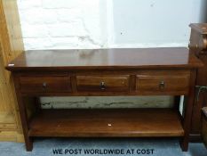 A cherry wood sideboard (width 140cm, depth 45cm,
