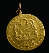 A 1729 George II young head five guinea coin on ring mount (42.