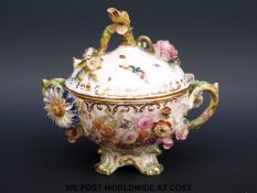 An early 19thC Coalbrookdale or early Coalport twin handled lidded sucrier finely decorated with