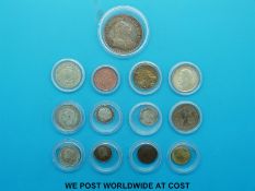 A George III three shilling bank token together with a further quantity of coins including silver