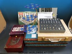 A collection of chess sets, Mah Jong games, compendium etc.