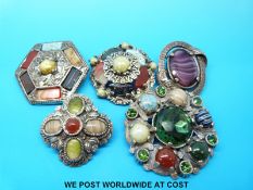 Five Miracle brooches,
