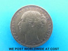 An 1886 gold full sovereign, Melbourne mint, young head,