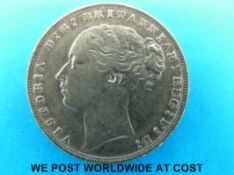 An 1876 young head gold full sovereign