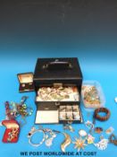 A collection of costume jewellery to include cufflinks, brooches, necklaces,