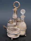 A cut glass and hallmarked silver cruet set, Birmingham 1881,