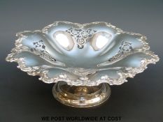 An Edward VII hallmarked silver tazza with pierced and embossed decoration, diameter 24cm,
