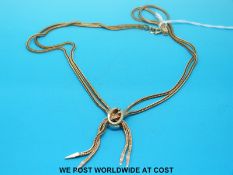 A 9ct gold two strand 9ct gold necklace (14.