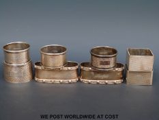 Eight various hallmarked silver napkin rings including Art Deco square example (weight 222g)