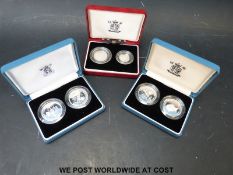 Three double coin sets comprising two proof silver five pence,