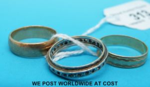 Two 9ct gold wedding bands and a white metal ring marked 9ct gold (7.