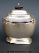 A George V hallmarked silver tea caddy, B'ham 1911, maker's mark rubbed, height 11.