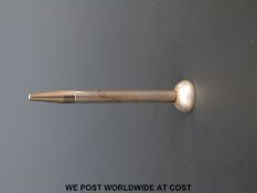 A modern hallmarked silver golf tee