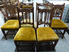 Four Arts and Crafts or Art Nouveau dining chairs together with two similar dining chairs
