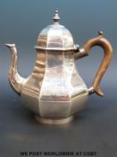 A Victorian hallmarked silver teapot of Georgian octagonal form,