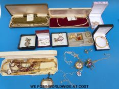 A small collection of costume jewellery, watches,
