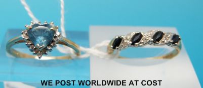 A 9ct gold ring set with a heart shaped blue topaz surrounded by diamonds and another 9ct gold ring