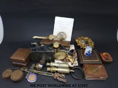 A collection of items to include coins, a gold plated pocket watch, watches,