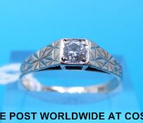 A 9ct gold ring set with a cubic zirconia (size G)