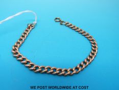 A 9ct gold curb link bracelet (17.