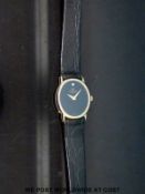 Raymond Weil ladies wristwatch with gold plated hand and single stone on black face,