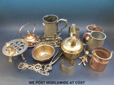 A collection of brass, copper and pewter items.