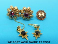 A pair of yellow metal earrings set with rubies and a pair of 9ct gold earrings