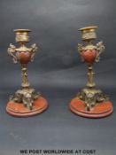 A pair of marble, bronze and part gilt candlesticks, the bases formed as elephants heads,