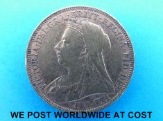 An 1894 gold full sovereign veiled head