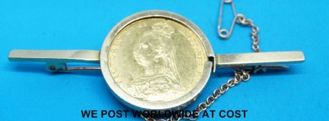 An 18ct gold brooch set with an 1887 gold full sovereign (12.