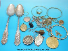 Two 9ct gold bangles, 9ct gold bracelet, two silver necklaces, silver locket, yellow metal lockets,