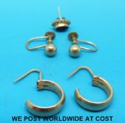 Two pairs of 9ct gold earrings