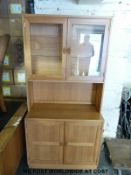 A glazed pine dresser (width 84cm, depth 43cm,