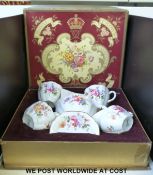 A boxed Royal Crown Derby Posies tea for two