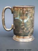 A Victorian hallmarked silver pint tankard, 12.