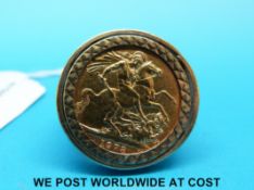 A 9ct gold ring set with a 1978 gold full sovereign (14.