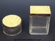 Two George V guilloche enamel hallmarked silver topped cut glass dressing table pots,