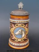 A Villeroy & Boch tankard with horse decoration