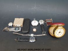 A collection of items including ladies gold watch,