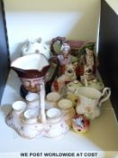 A collection of ceramics including nodding bisque figures, Crown Devon egg cruet on stand,