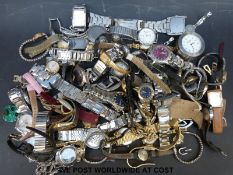 Over eighty various ladies and gentleman's wristwatches.