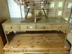 A Chinese altar/coffee table with four drawers (length 128cm, depth 40cm,